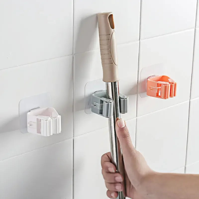 Laundry wall mounted mop holder