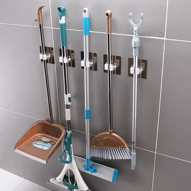 Laundry wall mounted mop holder